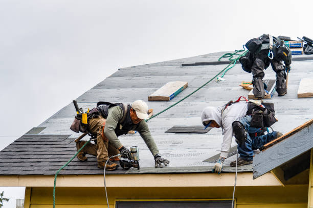 Professional Gutter Installation technician working in Mira Loma, CA